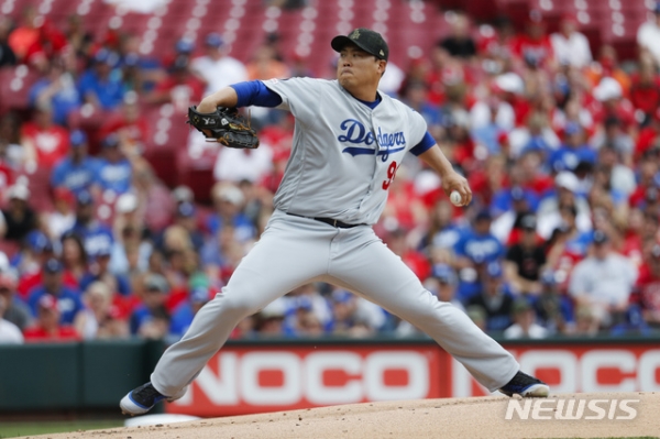 Los Angeles Dodgers starting pitcher Hyun-Jin Ryu throws in the first inning of a baseball game against the Cincinnati Reds, Sunday, May 19, 2019, in Cincinnati.